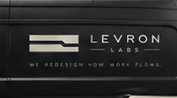 A Levron Labs van, wordmark along the panel
